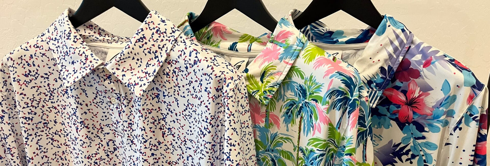 Golfista Apparel Co. Sustainable Performance Golf Polos on a clothing rack