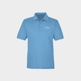 Blue polo shirt with Golfista Logo on a light gray background