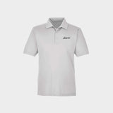 White polo shirt with Golfista logo on a light gray background