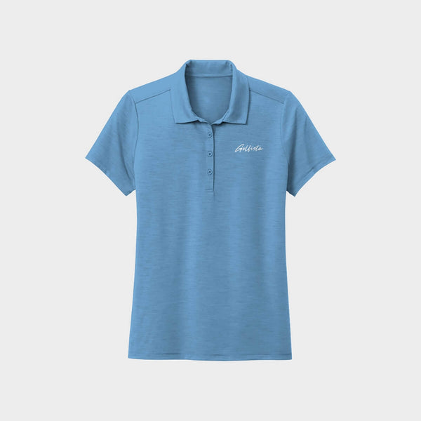 Light Blue polo shirt with Golfista logo on a light gray background