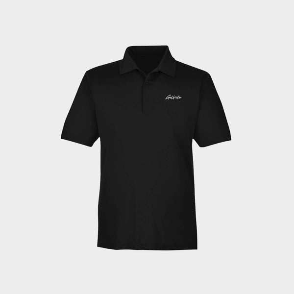 Black polo shirt with Golfista logo on a light gray background