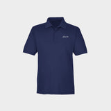 Royal blue polo shirt with Golfista logo on a light gray background